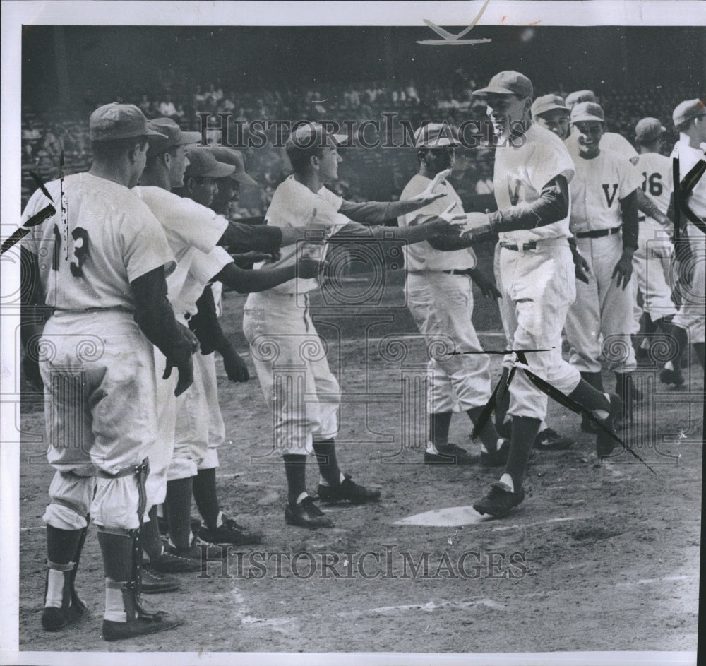 1957 Press Photo Congratulating a home run hitter - Historic Images