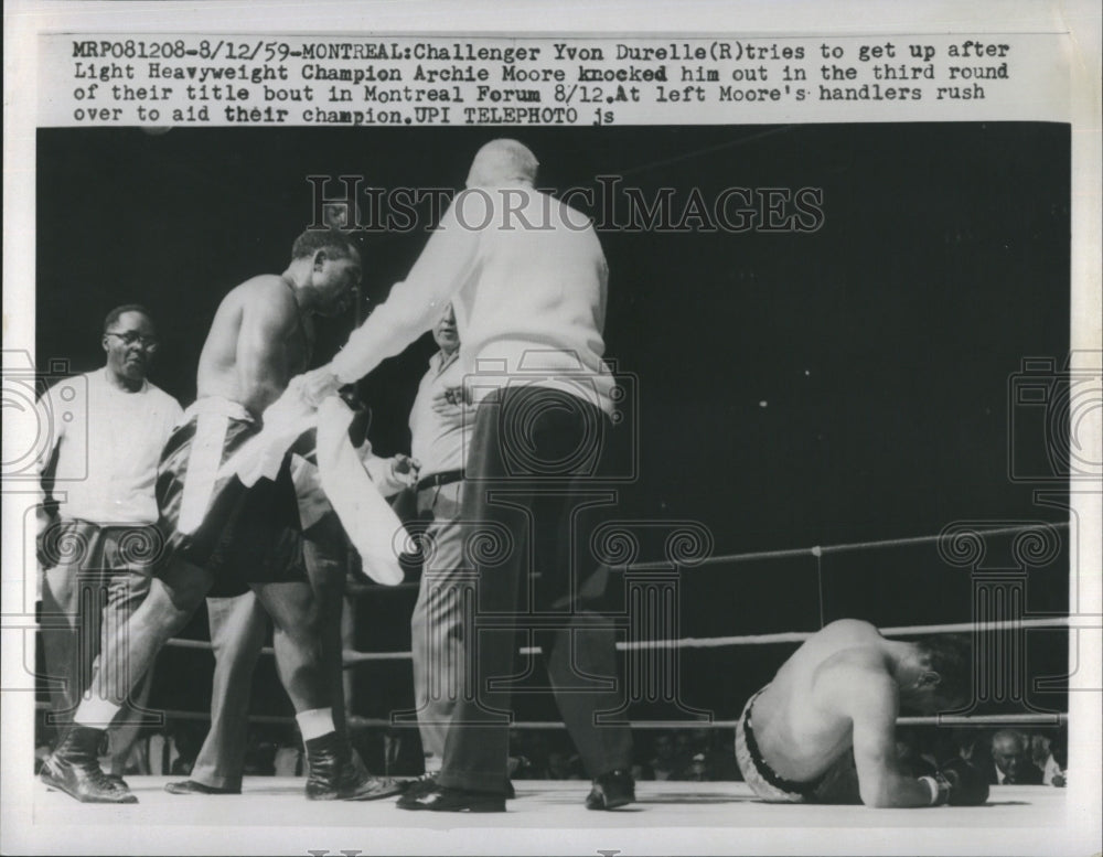1959 Yvon Durelle & Archie Moore in light heavyweight championship.-Historic Images