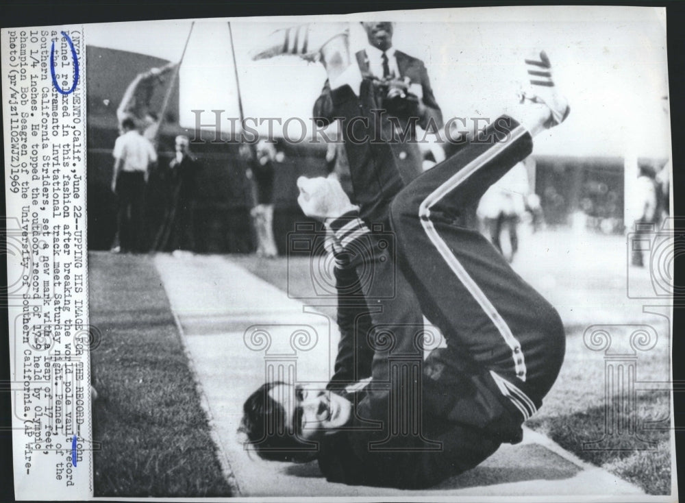 1969 John Pennel, world pole vault record.-Historic Images