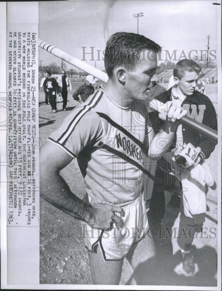 1963 Press Photo John Pennel holding his fiber glass pole. - Historic Images