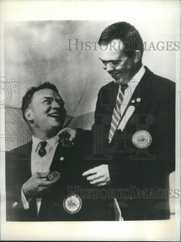 1965 Press Photo Gerald Quellette and Gilmore Boa shows their medal. - Historic Images