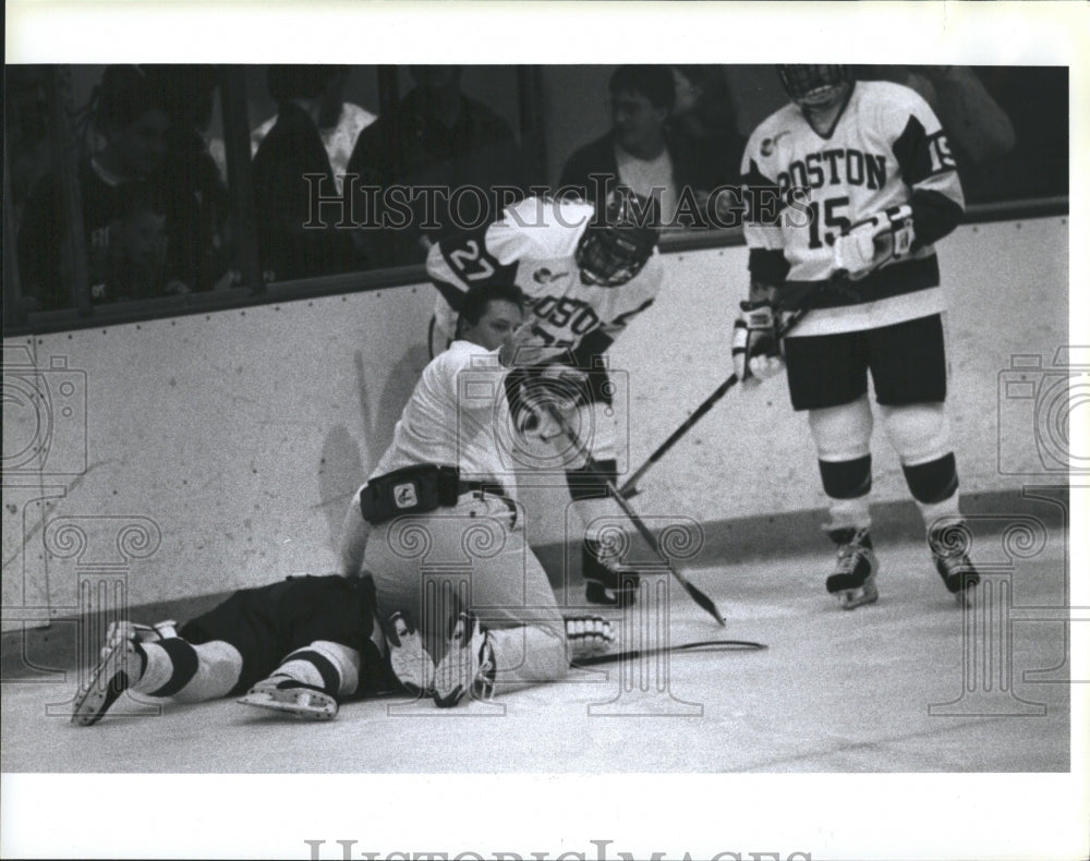 Press Photo Medic Checks On Player During Boston University Hockey Game - Historic Images