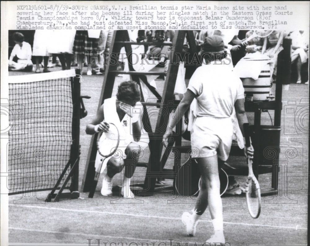 1959 Brazilian tennis star Maria Bueno become ill during her match.-Historic Images