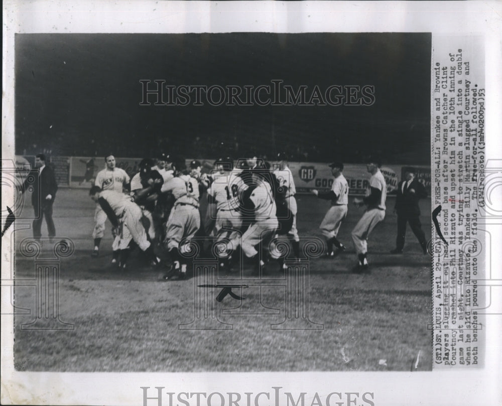 1953  Clint Courtney crashed in Phil Rizzuto, fight follows.-Historic Images