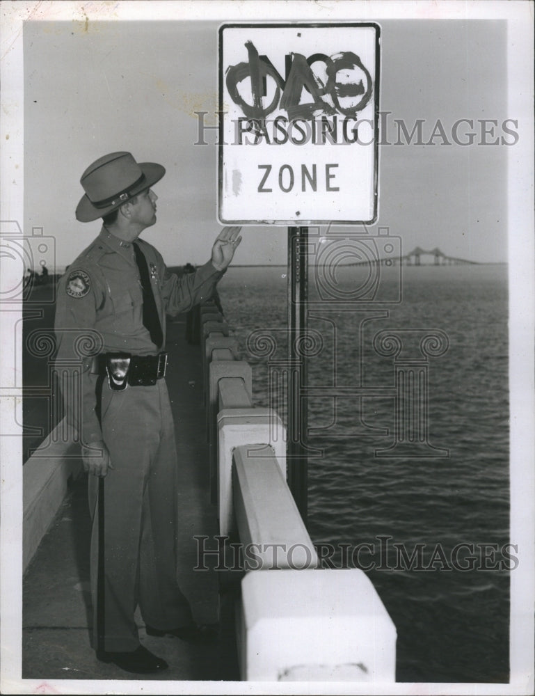 1956 Press Photo Sunshine Skyway Officer Vandalized Sign - RSH28597 - Historic Images