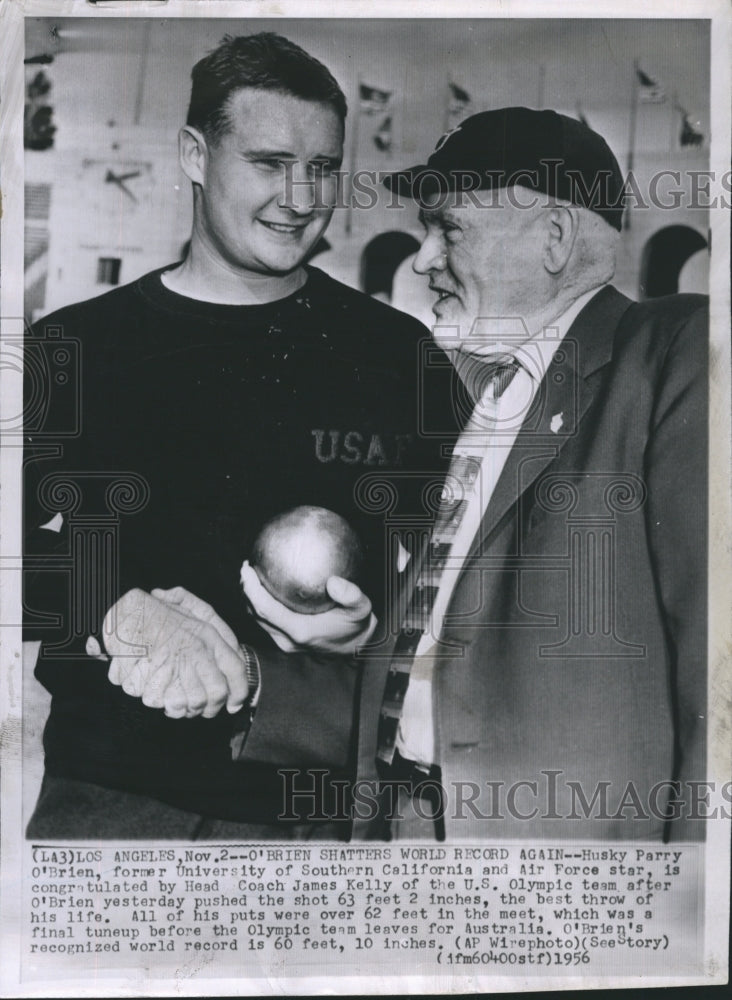 1956 Press Photo Husky Parry congratulate head coach James Kelly. - Historic Images