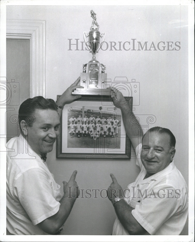 Press Photo St. Petersburg Saints Ralph Miller and Herb Smith with their trophy. - Historic Images