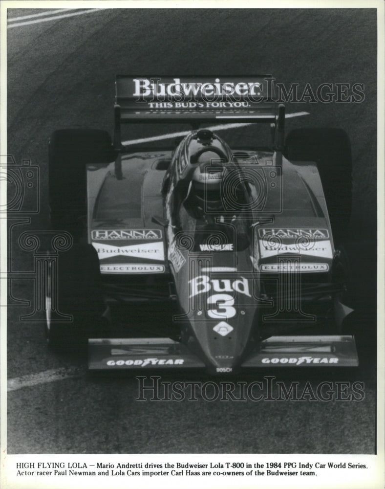 1984 Press Photo Mario Andretti Driving Budweiser Lola T-800 PPG Indy Car Series - Historic Images