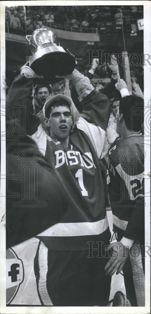 1990 Scott Cashman holds the trophy. - Historic Images