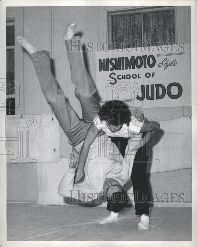 1958 Press Photo Girl Flips Man During Judo Demonstration - RSH36883 - Historic Images