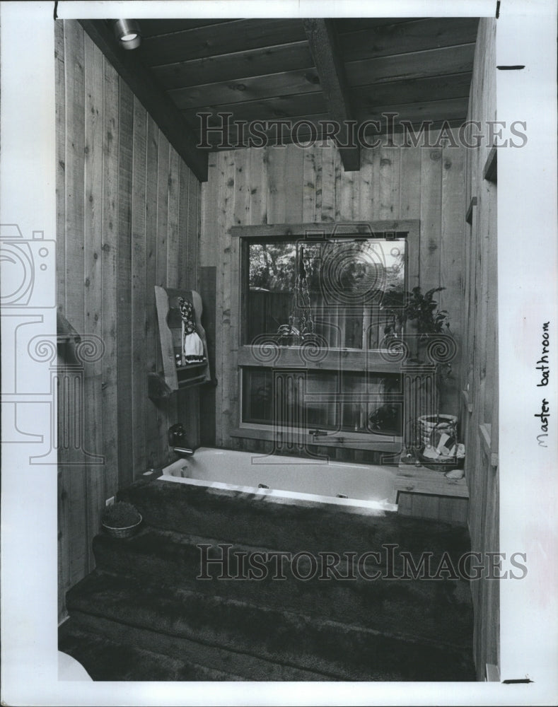 1981 The master bathroom feautures cedar walls and has a step-up whirpool-type tub-Historic Images