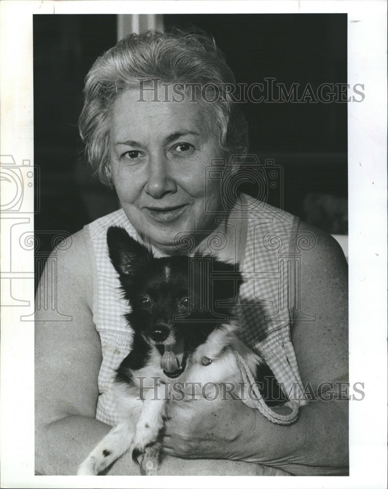 1982 Mary Petras reunited with her dog Tookie Wookie.  - Historic Images