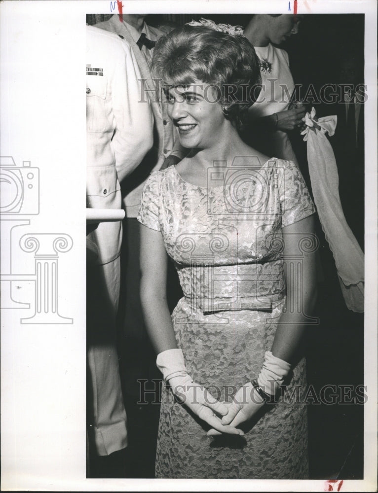 1962 Mrs. R.D. Mastry wearing a beige lace sheath - Historic Images