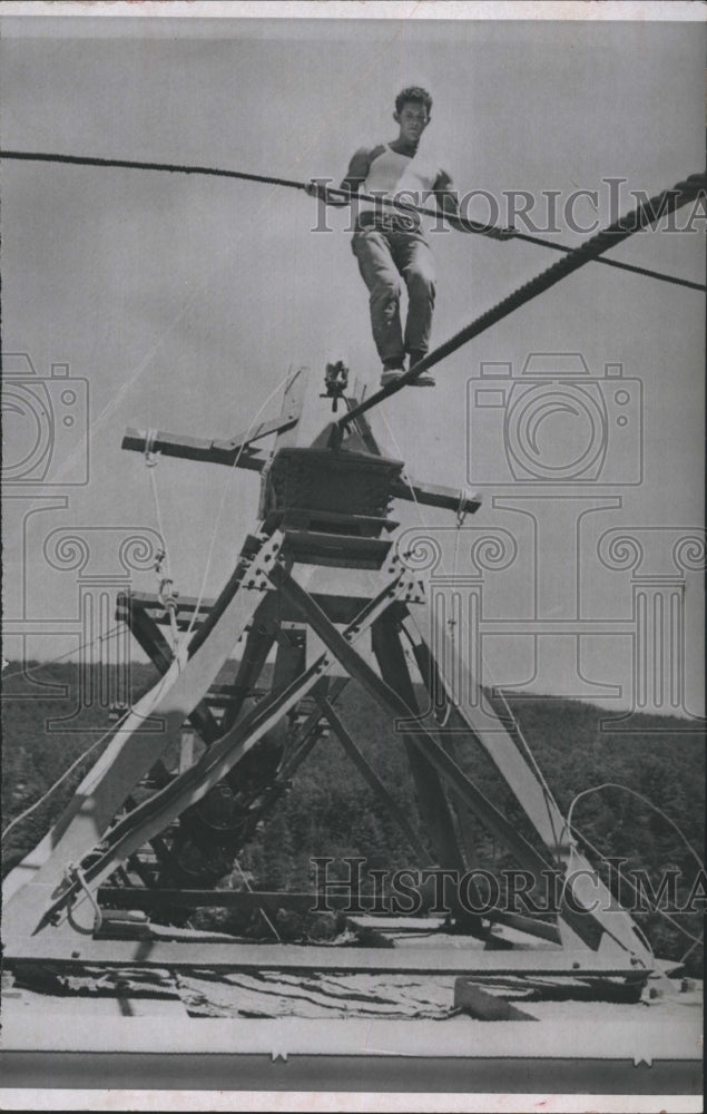 1970 Grady Prince balances a pole of high wire  - Historic Images