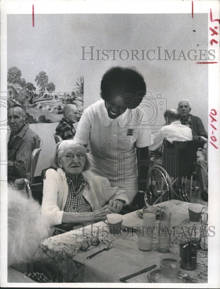 1971 Nurse James attend to Patient at Nursing Home.  - Historic Images
