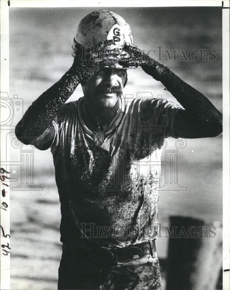 1980 Cleaning Oil Spill.  - Historic Images