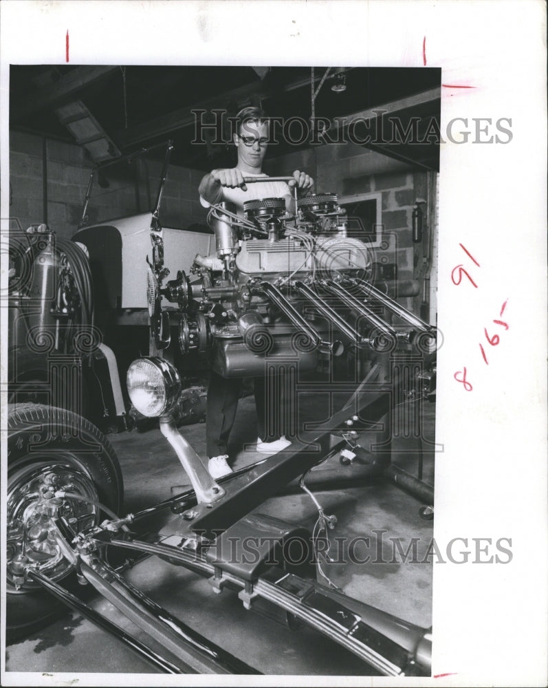 1969 Dan Myers in the process of modifying the car he finished. - Historic Images