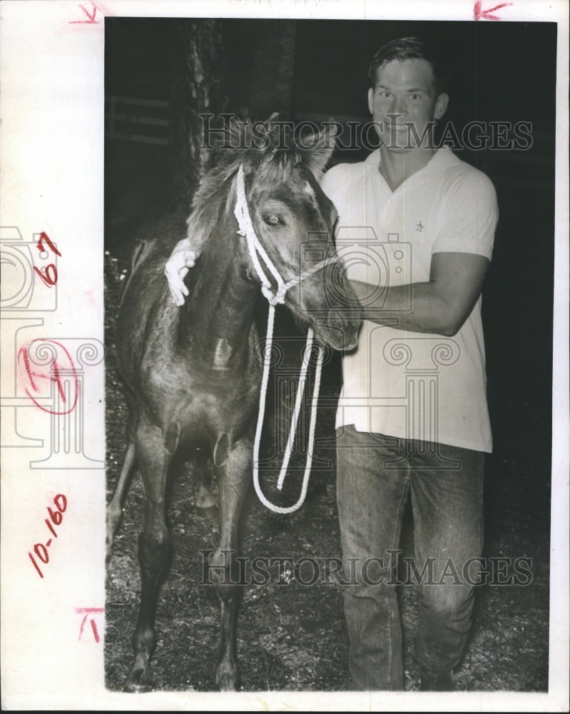 1966 Bob Dickson receives a quarterhorse filly for his birthday. - Historic Images