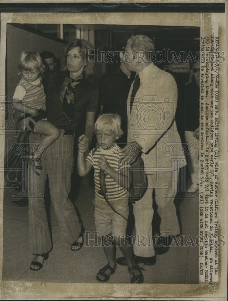 1972 Mrs. Edith Irving arrives at Guardia Airport with her children - Historic Images