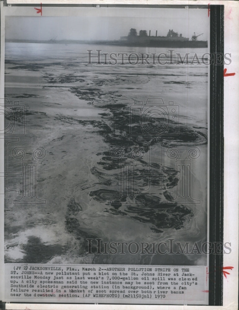 1970 A pollution stripe on the St. John's river after an oil spill - Historic Images