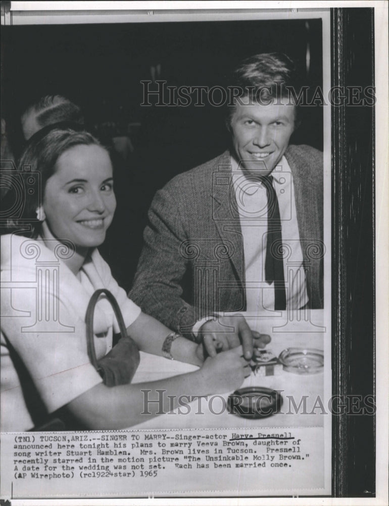 1965 Actor Harve Presnell with fiancee Veeva Brown.  - Historic Images