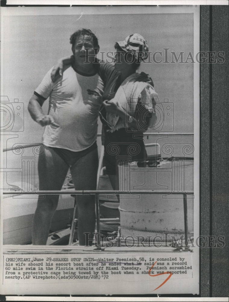 1972 Walter Poenisch  and wife stop to swim by shark. - Historic Images