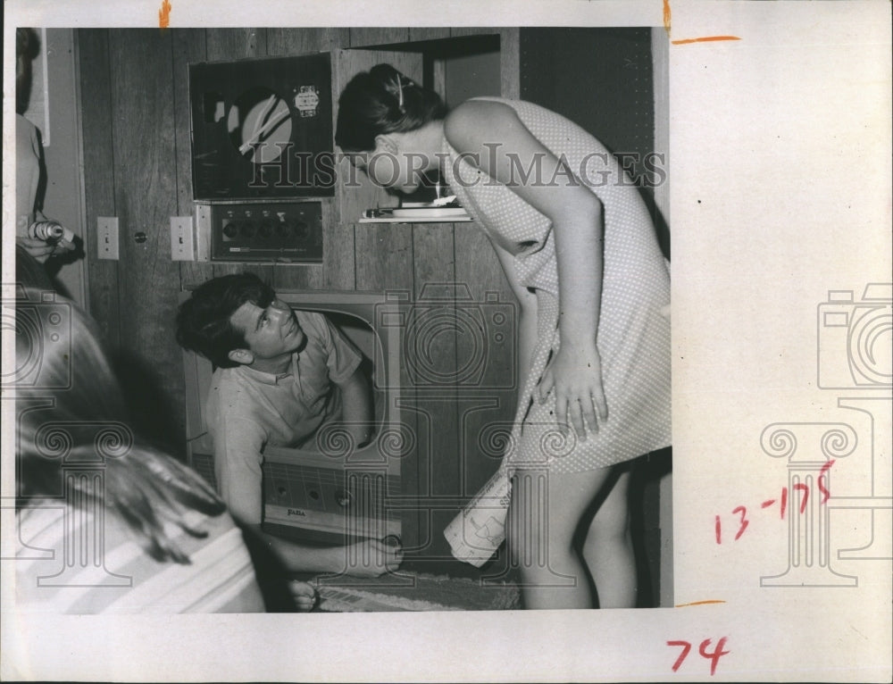 1969 New Port Richey youths working on a coffee house.  - Historic Images