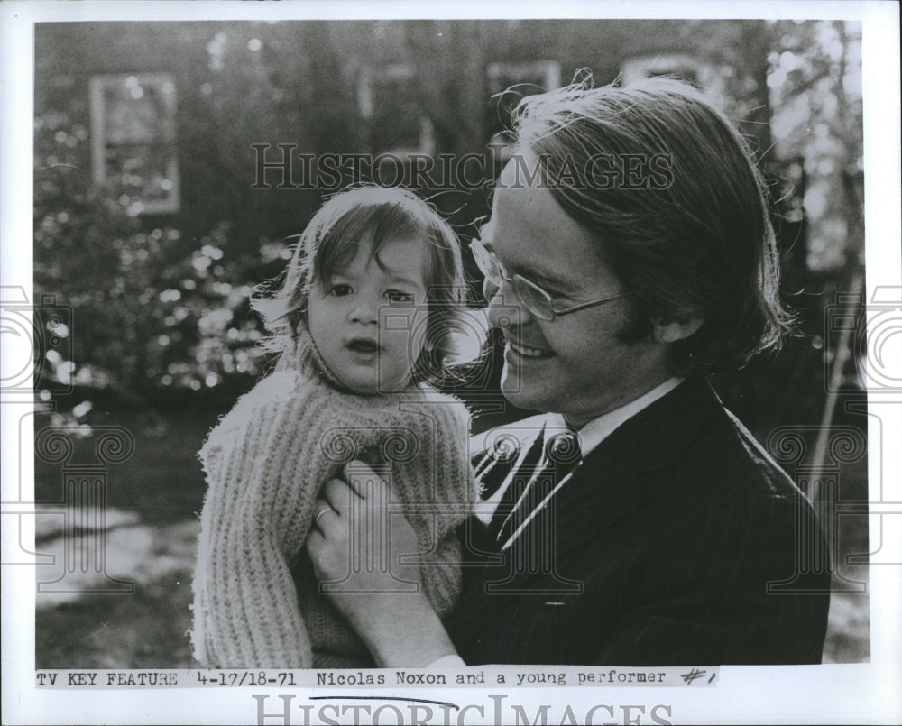 1971 Nicolas Noxon and a young performer. - Historic Images