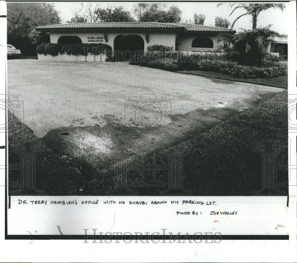 1980 Dr. Terry Hamblen Dental officewith no shrubs in parking lot. - Historic Images