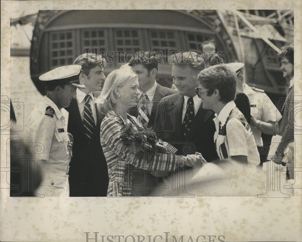 1975 Susan Ford gives hand skates.  - Historic Images