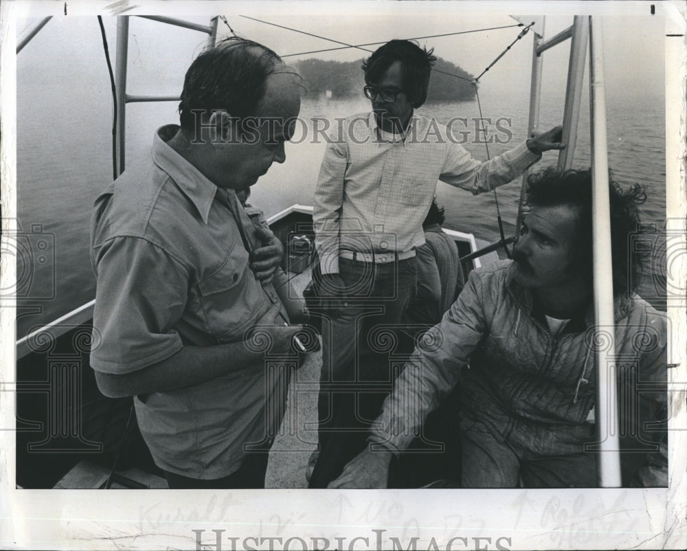 1978 Charles Kuralt(Left) on a boat with Ralph Hearth(right) - Historic Images