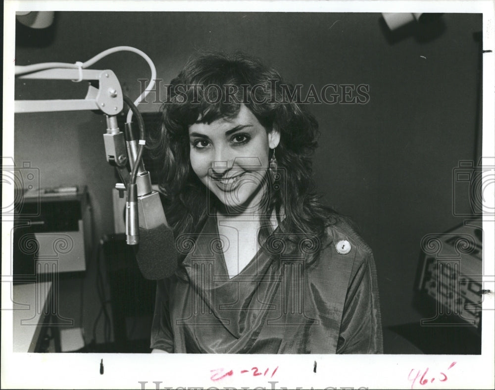 1985 Model Audrey Lynn at WMGG radio station. - Historic Images