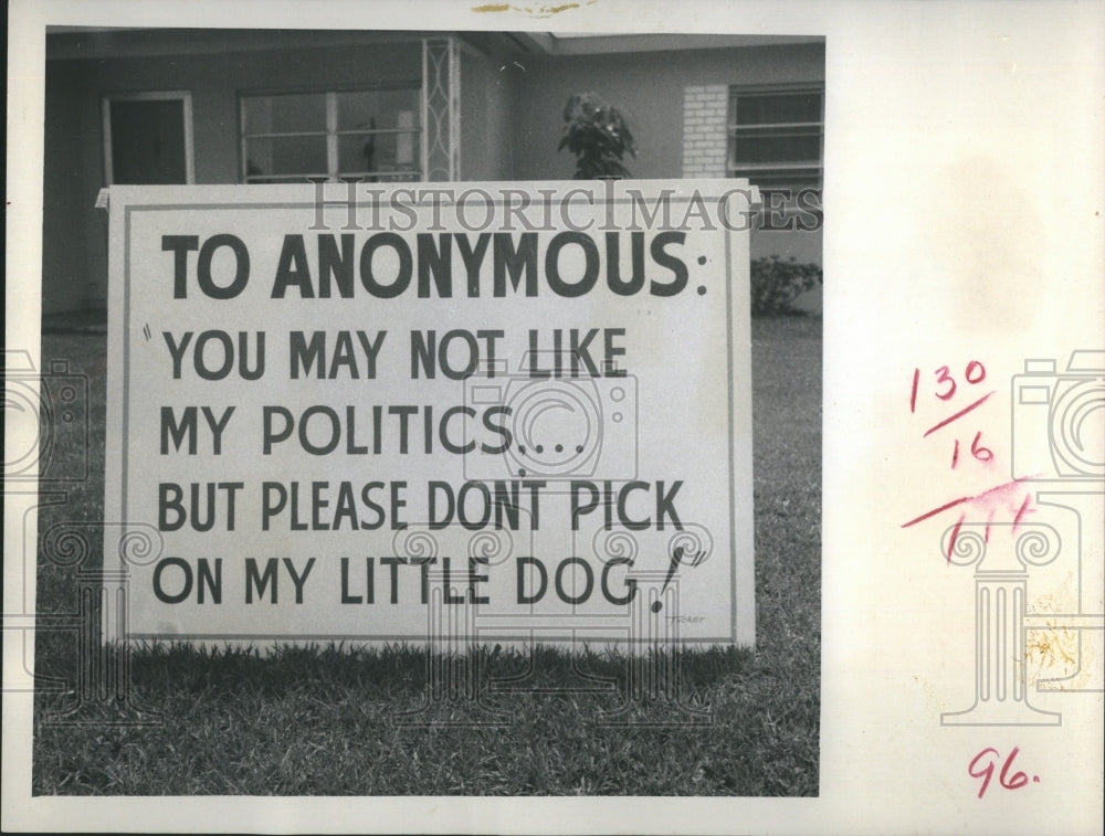 1971 Robert Lowry Protests Annoyance to Dog - Historic Images