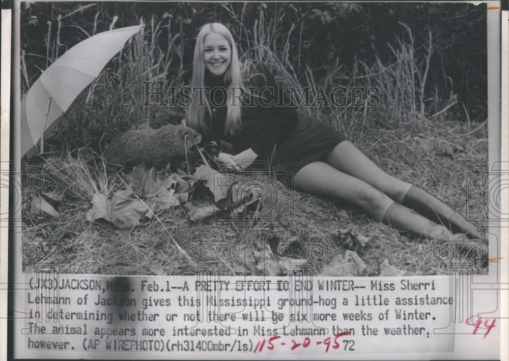 1972 Ground-hog gets help from Sherri Lehmann to end winter - Historic Images