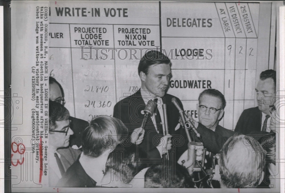 1964 George Lodge talks with newsmen about Henry Cabot Lodge - Historic Images