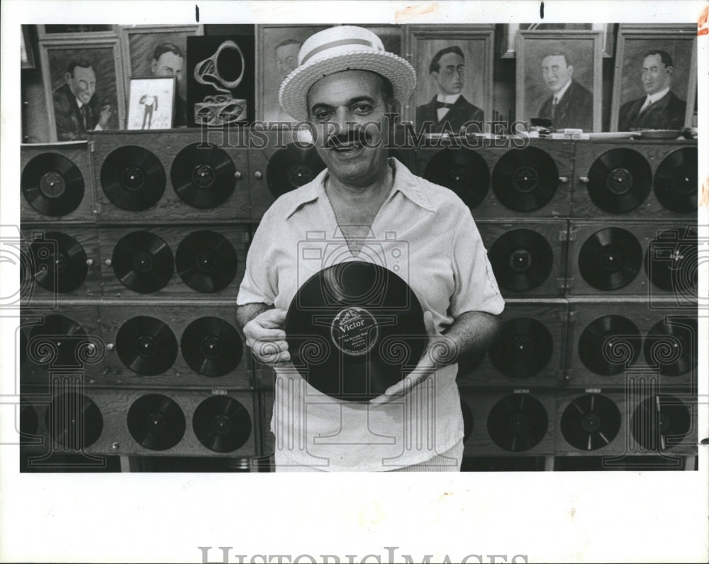 1986 John Doulou with his collection.  - Historic Images