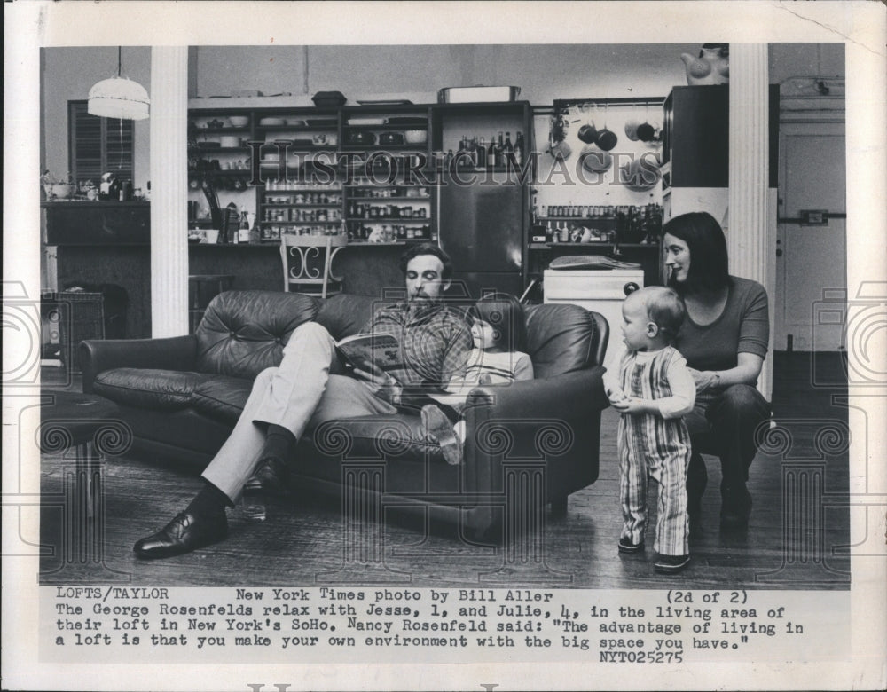 1975 Family relaxes in their loft in New York City. - Historic Images