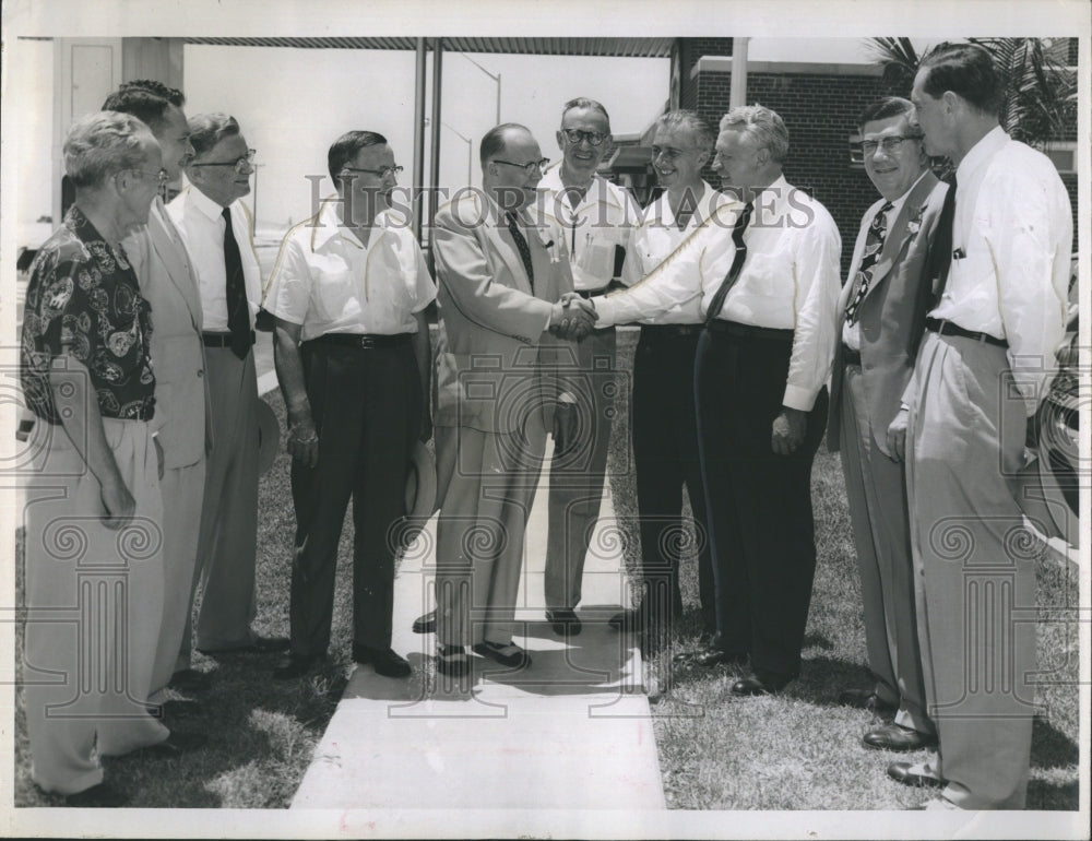 1955 Sen. Karl E.Mundt greeted at Sunshine Skyway toll gate. - Historic Images