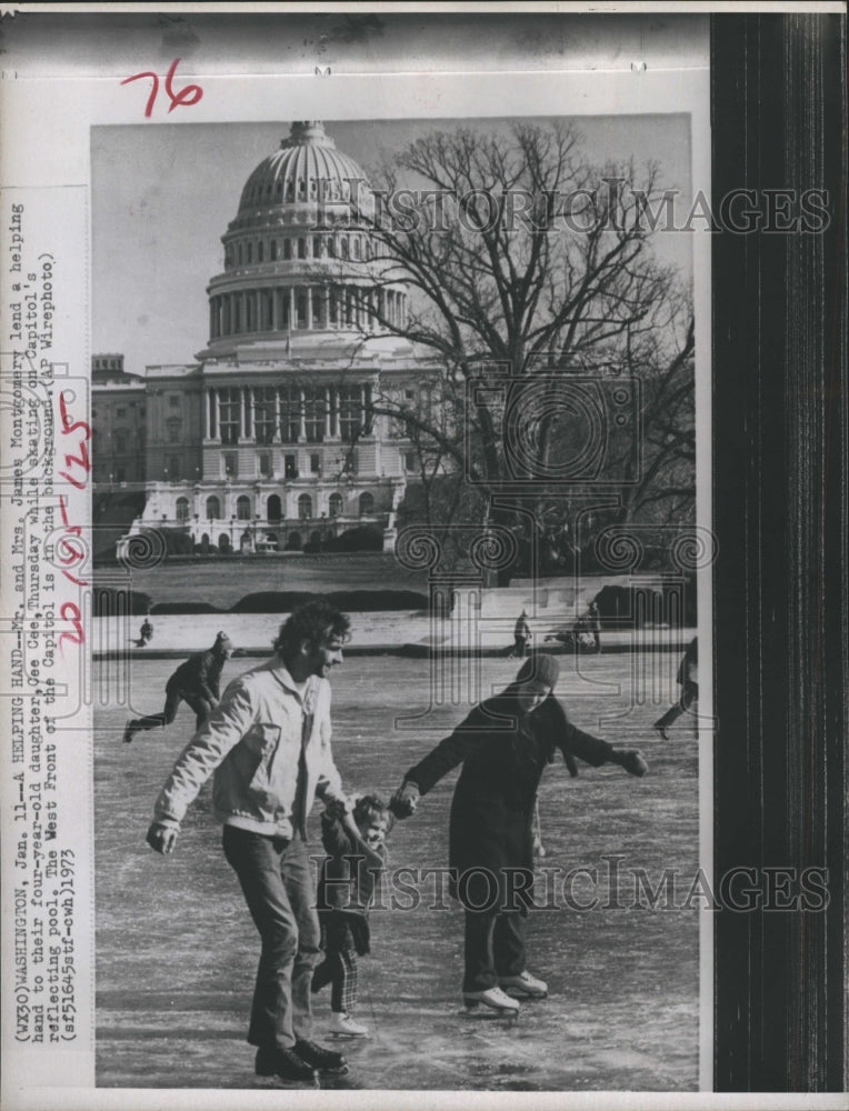 1973 Ice skating on Capital's reflecting pool. - Historic Images