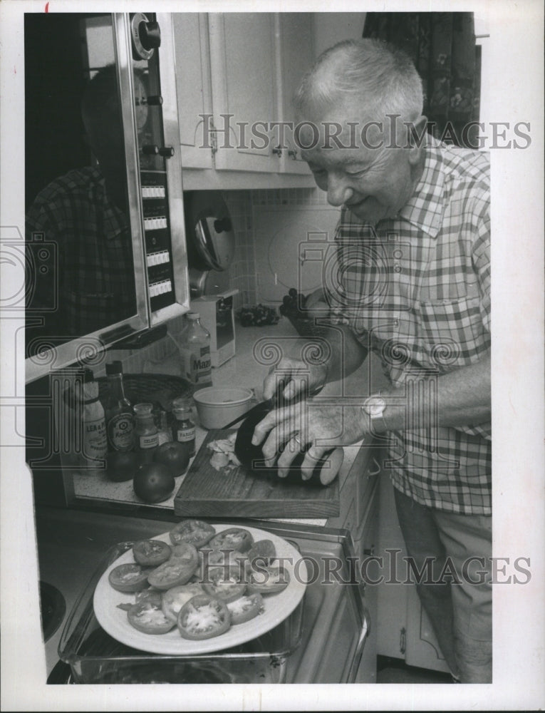 1970 Roderick W. Mattson Prepares Eggplant Florentine Recipe - Historic Images