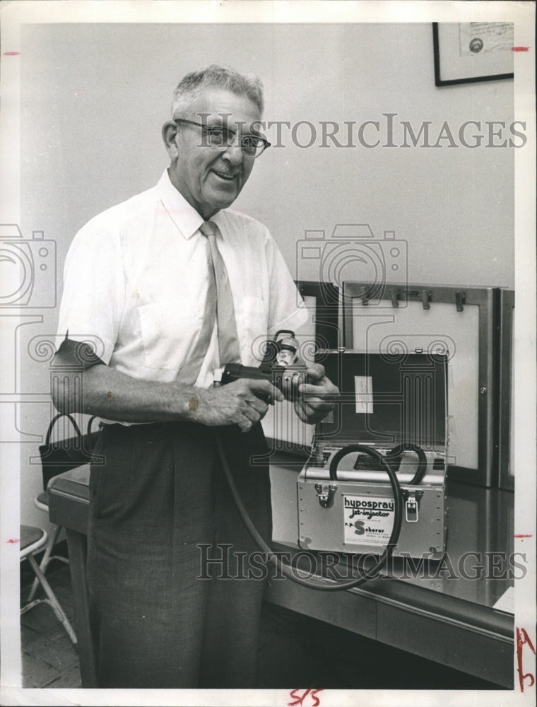 1961 Dr. Harry C. Oard with Equipment - Historic Images