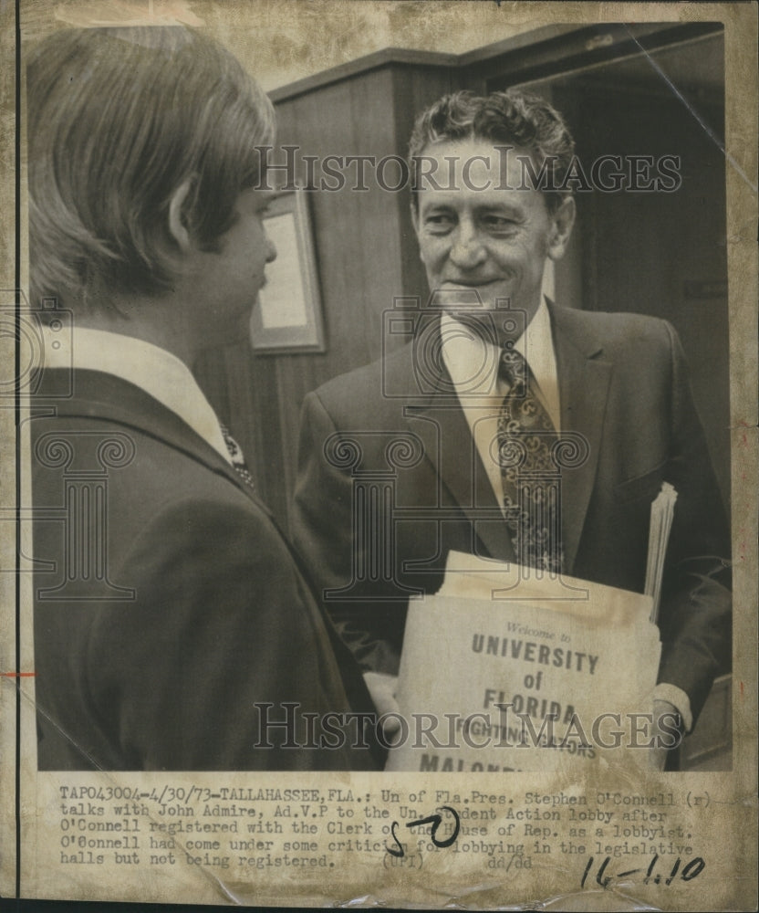 1973 Univ. of FL President Stephen O'Connell talks with John Admire - Historic Images