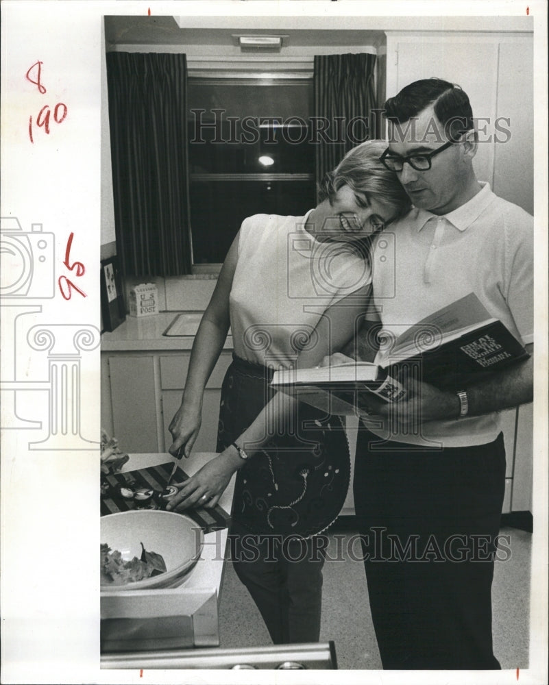 1966 Phil O&#39;Connell and wife cooking together.  - Historic Images