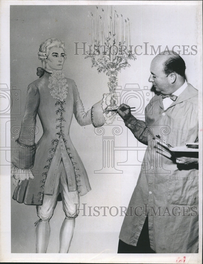 1958 Joseph Le Fer touches up a Louis XV painting in his shop - Historic Images