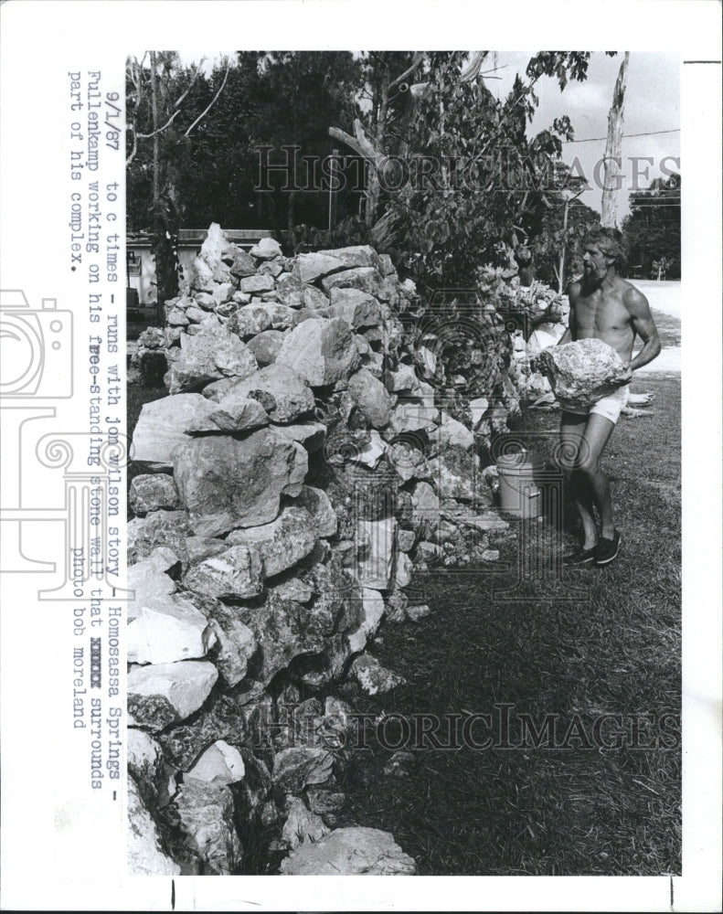 1987 Gerald Fullenkamp&quot;s home is out door in stone enclosure - Historic Images