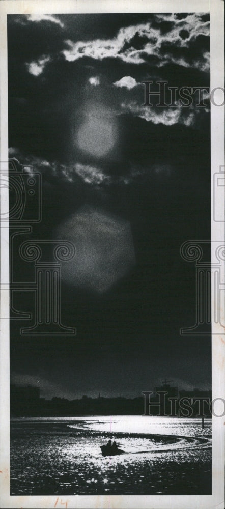 1974 Boat on a Lake at Night  - Historic Images