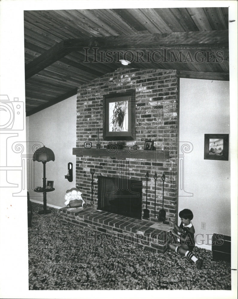 1979 Ryan Frazer Spends Time In His Family Living Room With Hearth - Historic Images