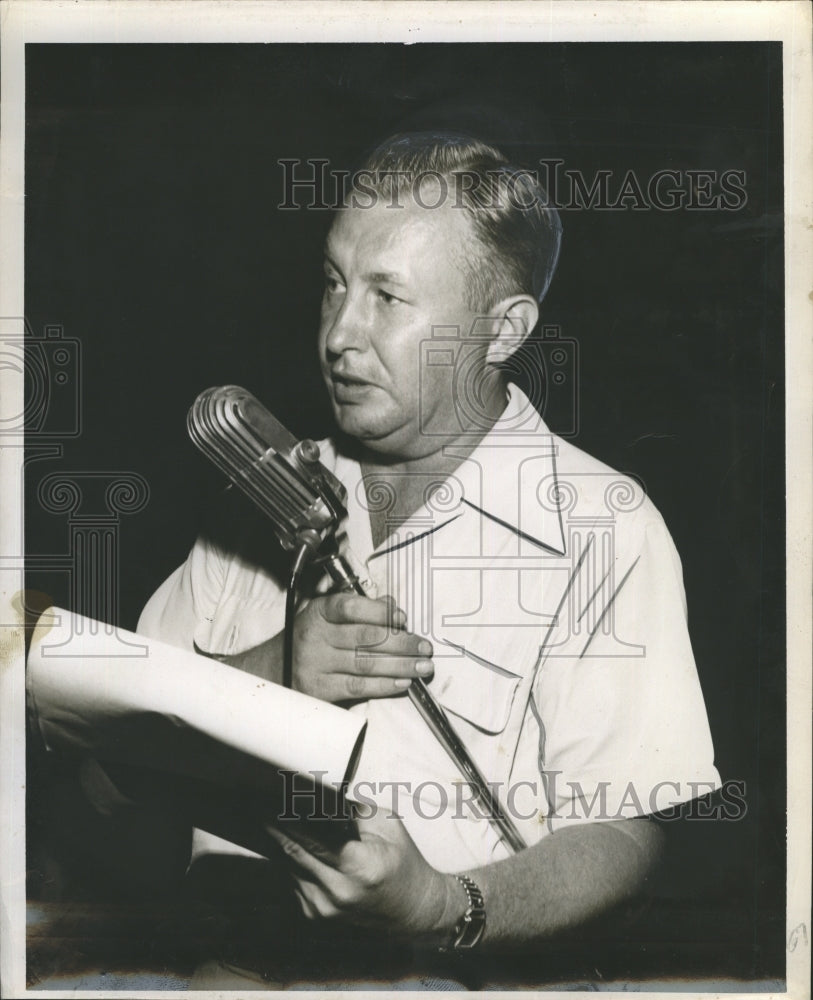 Arv Swirbul Talks Microphone  - Historic Images
