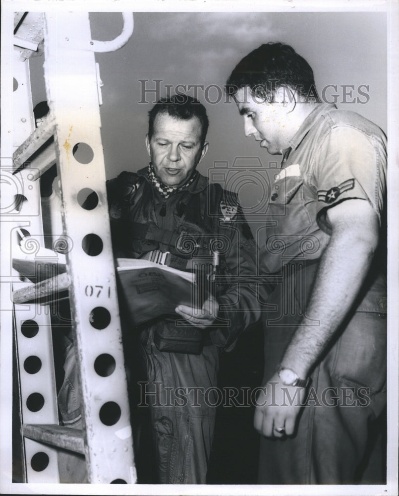 1966 Col. Edward Taylor Makes Pre-flight Check in Saigon - Historic Images