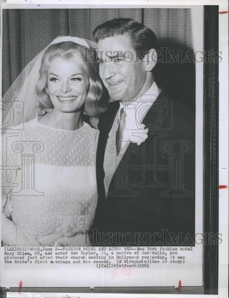 1963 Rod Taylor and bride Mary Hilem just after their wedding - Historic Images